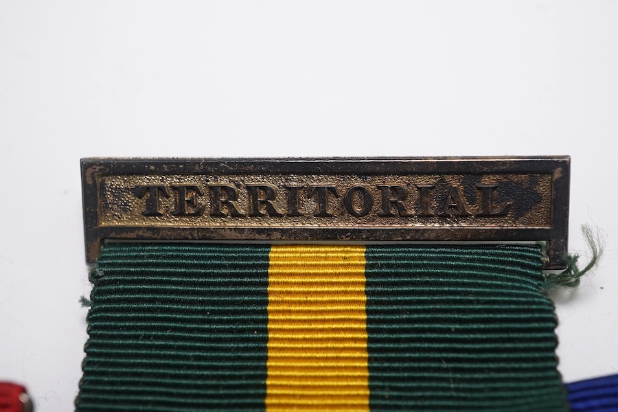 Four ERII service medals; Imperial Service medal to Alexander Manuel, another to Sydney John Jeffery (Technician Class IIA, Telecommunications Headquarters; Civil Defence Long Service unnamed; Territorial Efficiency Deco